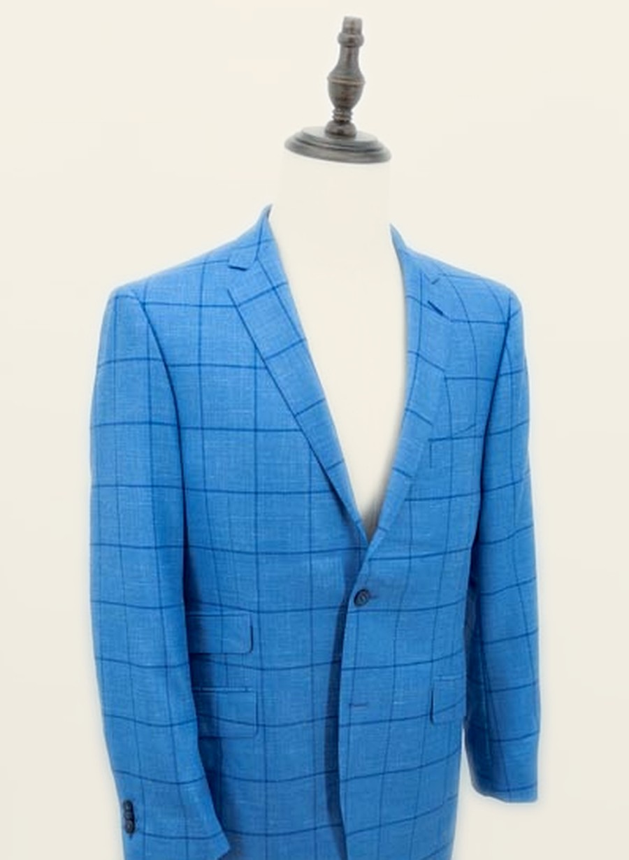 Bright blue windowpane sport coat on tailor's dress form